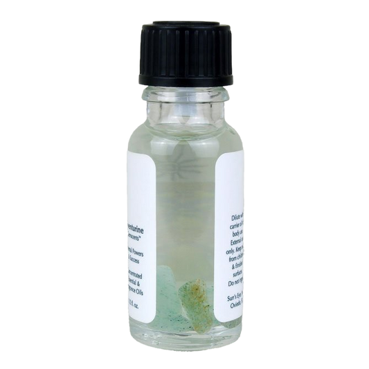 Small glass bottle with a black cap on a white background