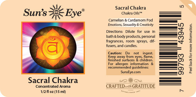 Sun's Eye Sacral Chakra essential oil label with chakra symbol and product details.