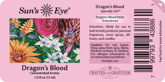 Label for Sun's Eye Dragon's Blood specialty oil with floral design and text.