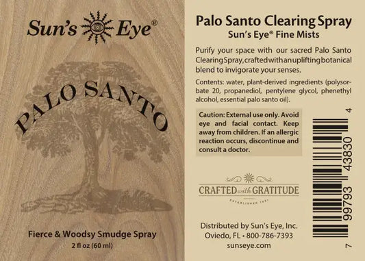 Label of Sun's Eye Palo Santo Clearing Spray with tree illustration and text.
