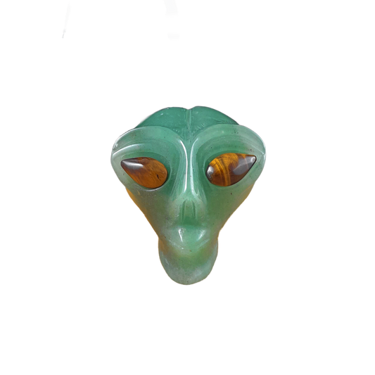 green aventurine alien skull with tiger eye eyes