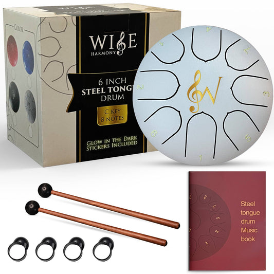 Wise Harmony 6-inch steel tongue drum set with packaging, drum, mallets, and music book on a white background.