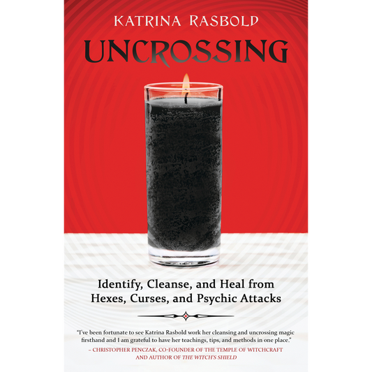 Book cover of 'Uncrossing' with a glass of black liquid on a red background