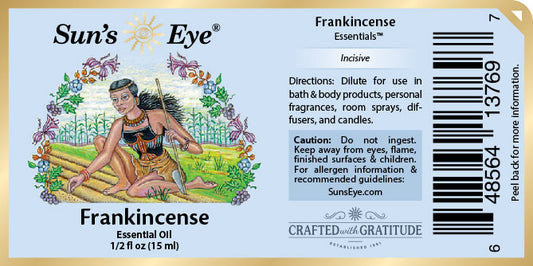 Sun's Eye Frankincense Essentials essential oil label with illustrations and text.