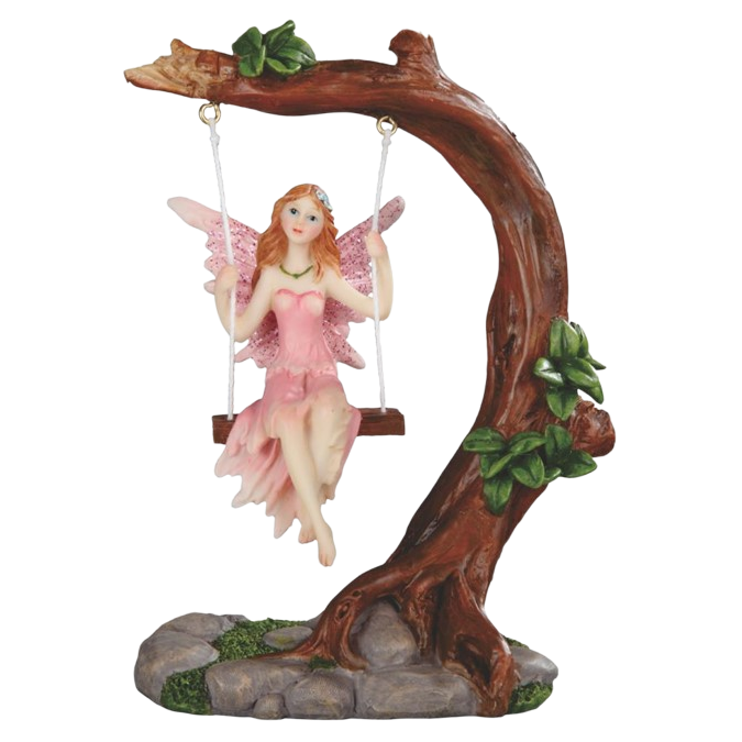 A fairy figurine sitting on a wooden swing attached to a large tree branch base, with pink wings and a pink dress, set against a plain white background.