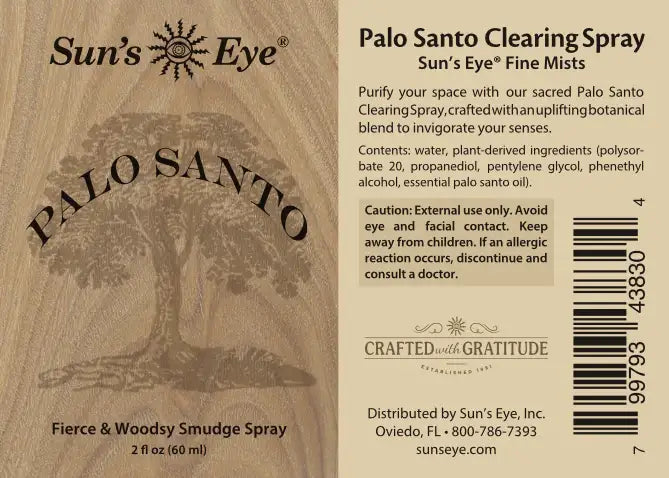 Label of Sun's Eye Palo Santo Clearing Spray with tree illustration and text.