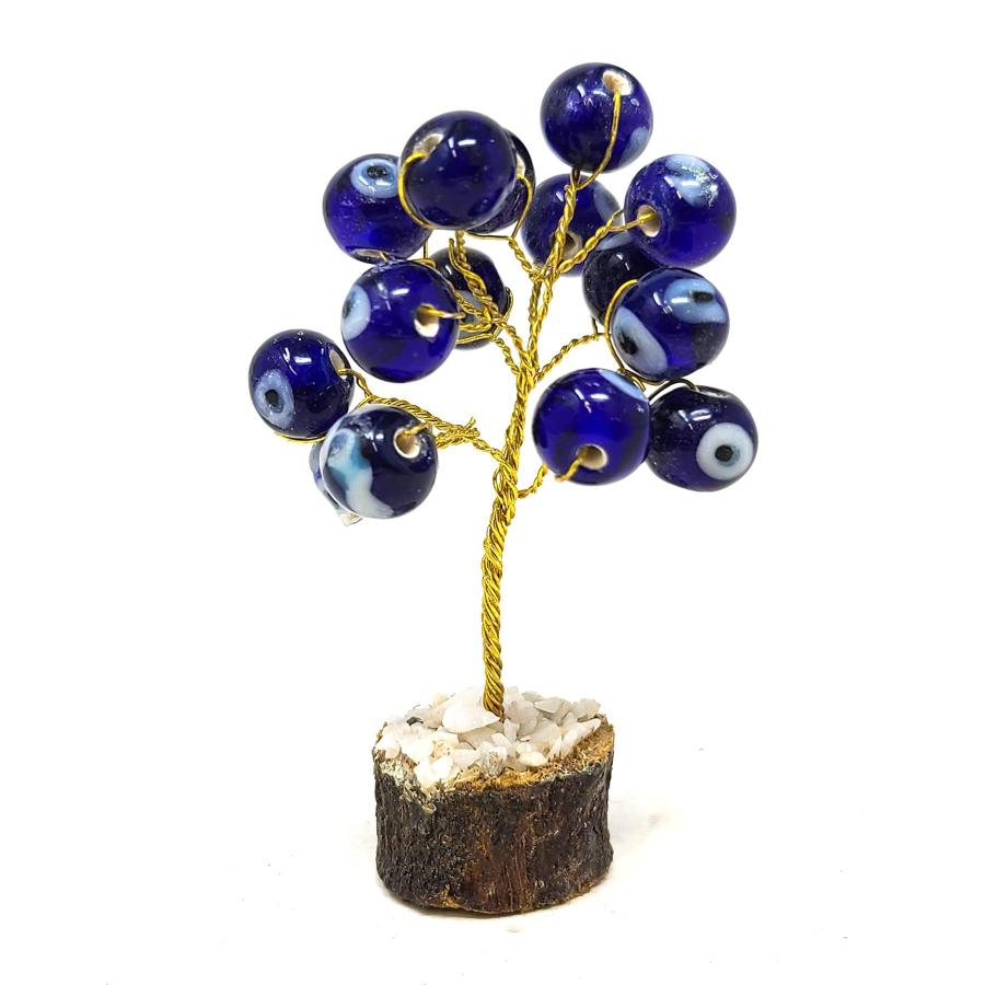 evil eye tree on wood base