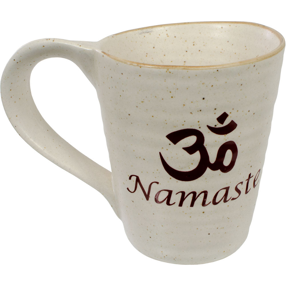 Ceramic coffee mug with OM symbol above the greeting "Namaste"