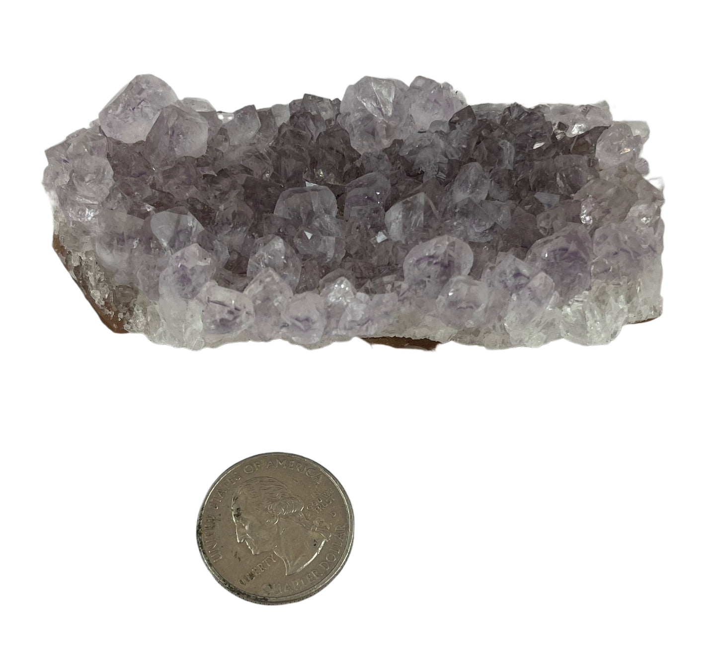 Palm sized purple crystal, roughly 2 in by 3.5 in